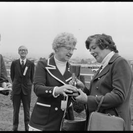 Horse racing. The Whakatāne Cup being presented to the wife of the owner-trainer of winning horse Sakata.