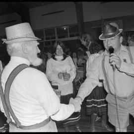 People enjoying themselves at a Bavarian stein evening at the Greerton Hall.