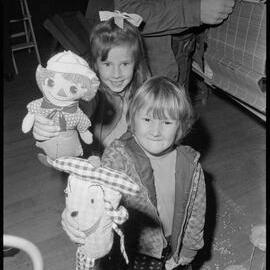 Alison and Hilary Lord with new acquisitions from Holy Trinity Church's mini-fair.