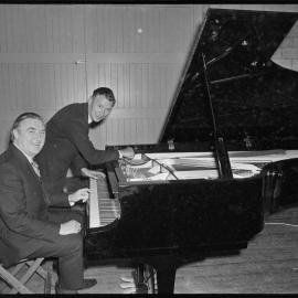 Mayor of Tauranga Mr R. A. Owens and tuner Mr R. J. Stewart with the new concert grand piano for Tauranga Town Hall.
