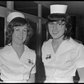 Staff nurses E. A. Bunting and M. M. Brown at Tauranga Hospital's  graduation ceremony.