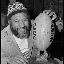 Tony Tukaokao carved the bases to display three autographed rugby balls.