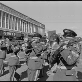RNZAF Band marching down Grey Street.