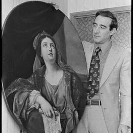 Dr Franco Olivetti with a late Renaissance painting now resident in Tauranga.