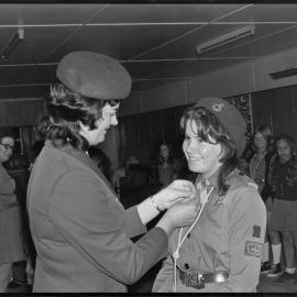 Girl Guide receiving an award.