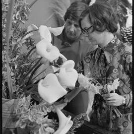 Preparing an arrangement for the "Flowers in Praise" festival.