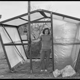 Mr N. M. Bell in a hothouse of his own design.