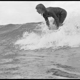 Paul Ruddell surfs