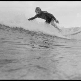 Paul Ruddell surfs