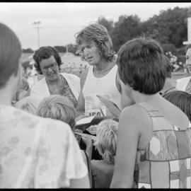 John Walker gives autographs
