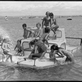 Children on boat, Pilot Bay