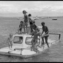 Children on boat, Pilot Bay