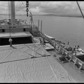Unloading ship's explosives