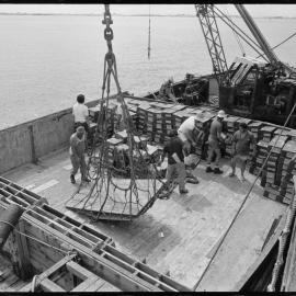 Unloading ship's explosives
