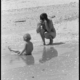 K. Brewer and son at beach