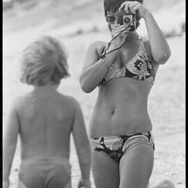 K. Brewer and son at beach