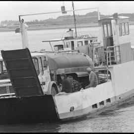Milk tanker on barge from Matakana Island