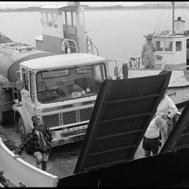 Milk tanker on barge from Matakana Island