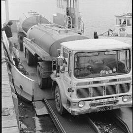 Milk tanker on barge from Matakana Island