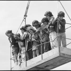 Children in suspended cage