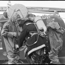 Firefighters remove chemical spill