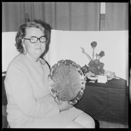 Woman with silver tray