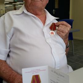 Bill Chapman 2015 with the Ushakov medal