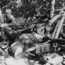 New Zealand soldiers with machine guns at Velalavela, Soloman Islands