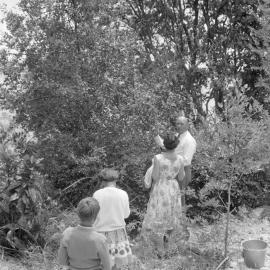 George Walsh with rescued boy, 1959