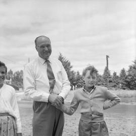 George Walsh with rescued boy, 1959