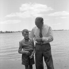 George Walsh with rescued boy, 1959