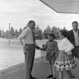 George Walsh with rescued boy, 1959