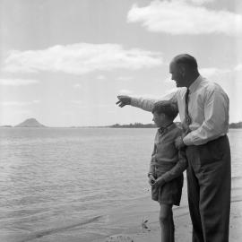 George Walsh with rescued boy, 1959