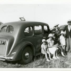 Picnic with Austin car circa 1940s