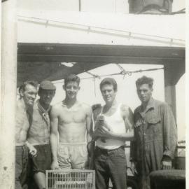 Holding monkey aboard the British Corporal