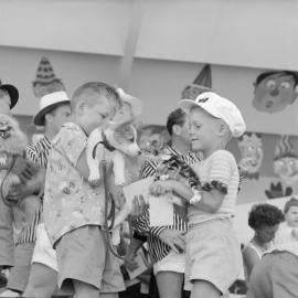 Children with pets at the Soundshell, 1960
