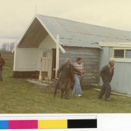 Kaikohe Rolleston, Ron Taingahue, & Wiremu Gardiner outside Tamaoho wharenui (Ams 248)