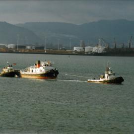 Historic Village Taioma tug being tugged