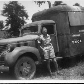 Soldiers next to truck