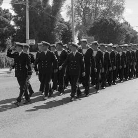 Men in uniform marching