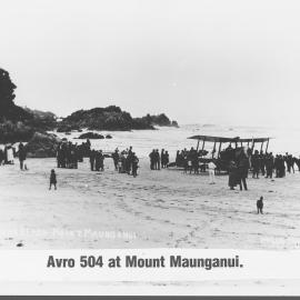Bi-plane landed on then Mount beach in the 1930s