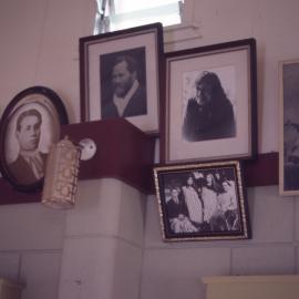 Framed photo's of tipuna in Werahiko wharenui at Paparoa marae