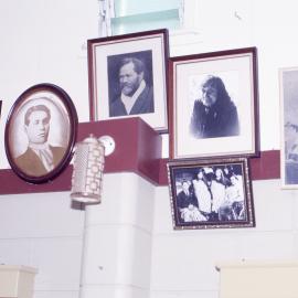 Framed photo's of tipuna in Werahiko wharenui at Paparoa marae