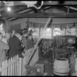 Tauranga Museum Opened. Charlie Haua with the old forge, with onlookers