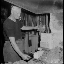 Tauranga Museum Opened. Charlie Haua with the old forge