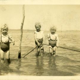 Skinner children paddling, Katikati WWII