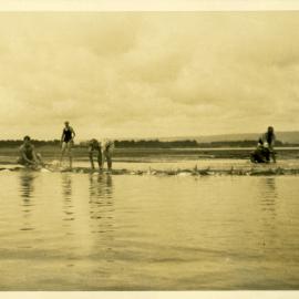 Fishing for flounder, Katikati, WWII
