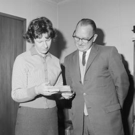 Mrs Parnell and Mr Ullness discussing baking competition