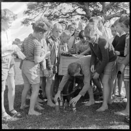 Primary School pupils collecting bottles to sell for Ōpōtiki relief fund.