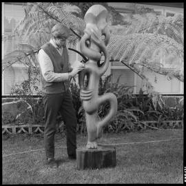 Jon Freeland with his carving Raurangi